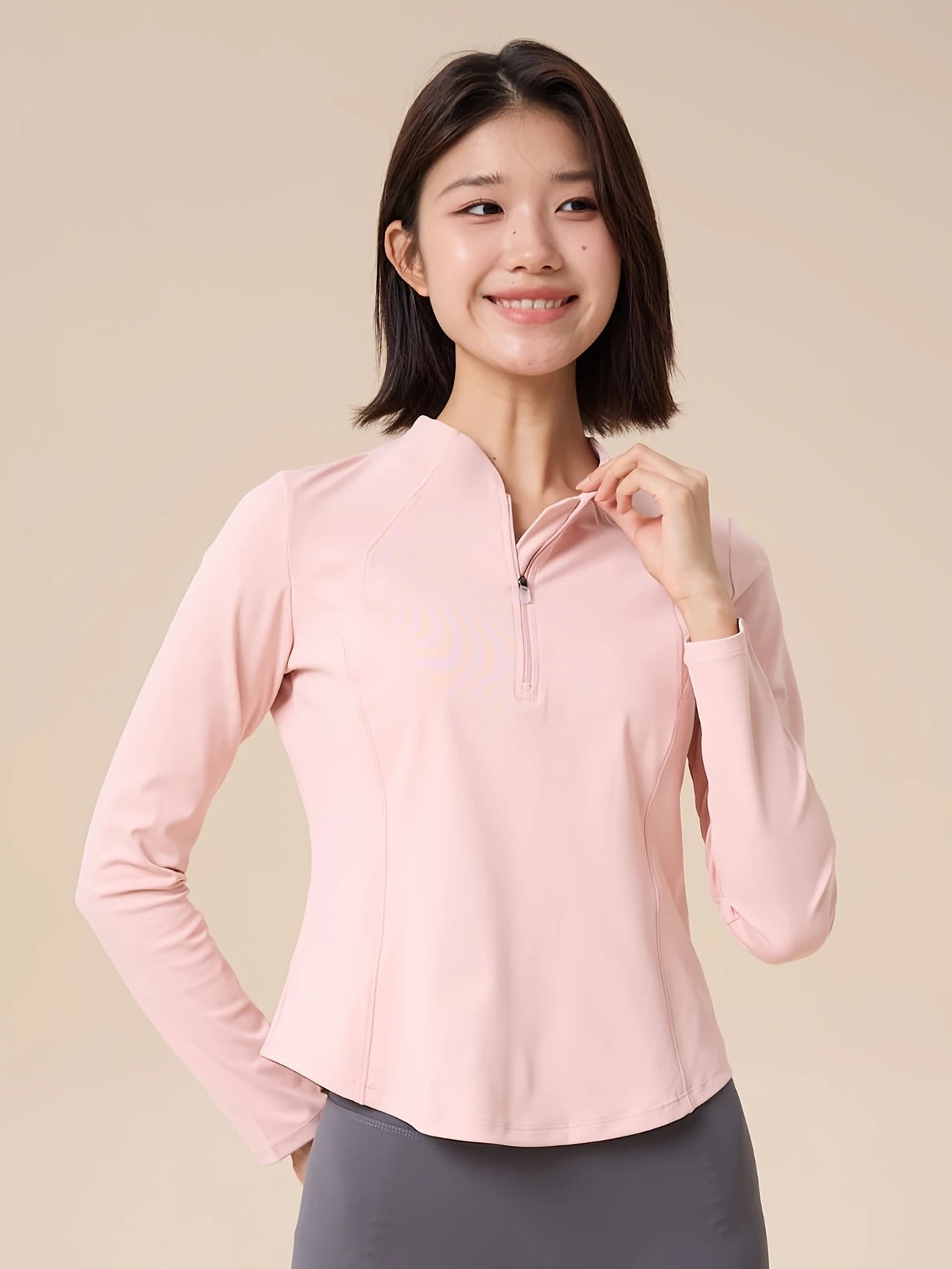 ハーフジップスリミングトップス