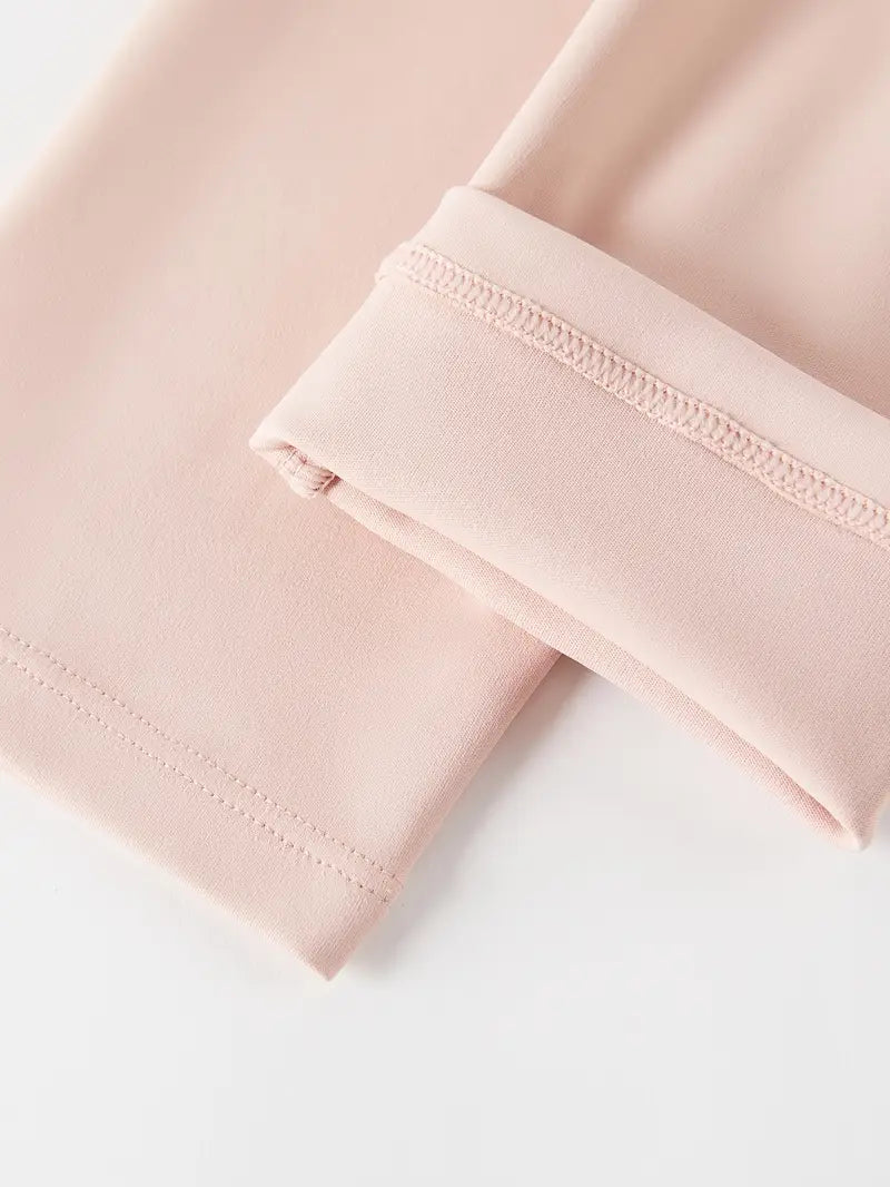 ハーフジップスリミングトップス